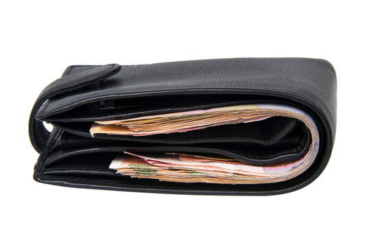 Black leather wallet with money isolated on the white background