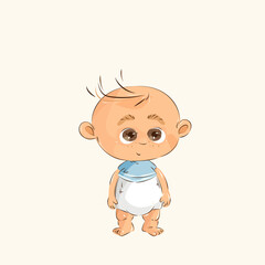 Obraz premium Little baby boy is standing in a diaper and a blue t-shirt