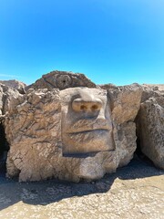stone face statue