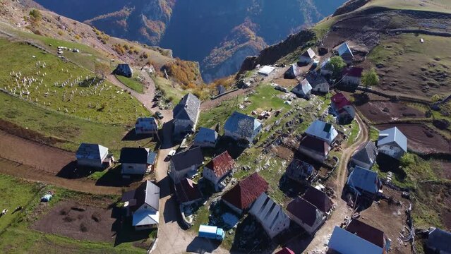 Aerial drone view of mountain village Lukomir in Bosnia and Herzegovina. Unique and traditional village. Unique village in Europe. Medieval traditional way of living. Rural tourism and holidays. 
