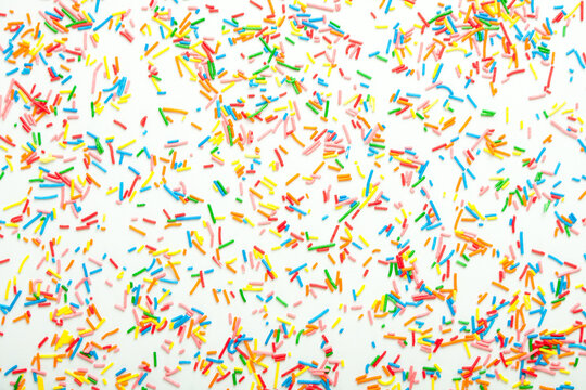 Sweer sugar prinkles background. Sugar prinkles backdrop.