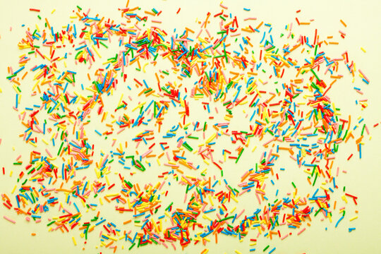 Sweer sugar prinkles background. Sugar prinkles backdrop.