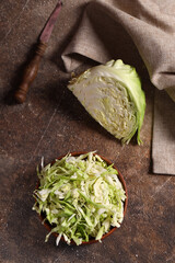 cole slaw cabbage salad on wooden table - obrazy, fototapety, plakaty