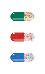 Colorful pills set. Green, red and blue pills isolated on the white background. Transparent pills collection. Capsule pills.