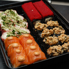 Bright sushi on a dark background	