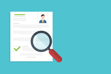 Resume analysis, use magnifying glass to view recruitment resume, concept of recruitment and human resources