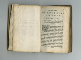 Weathered old book pages. An old medical book with its pages on display.
