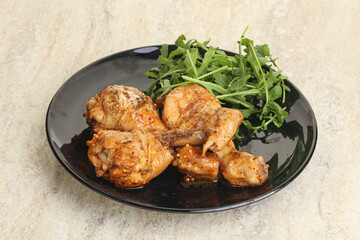 Roasted chicken leg with rucola