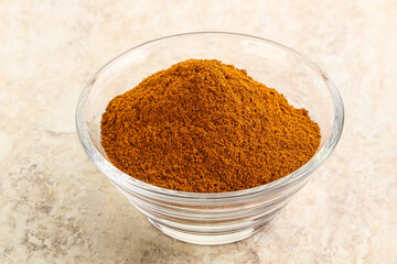 Dry Paprika powder in the bowl