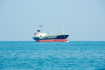 Angle side view of oil tanker container ship at sea. Crude oil tanker lpg ngv at industrial estate...