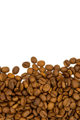 Coffee beans isolated on a white background. One side is full of coffee, the other side is left blank for writing. Close-up. Copy space. Empty space for text. Top view