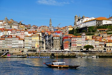 Fototapeta na wymiar Amazing panorama of Porto and Douro River with boats, Portugal