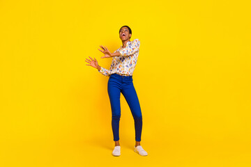 Fototapeta na wymiar Full body photo of excited carefree person enjoy clubbing free time isolated on yellow color background