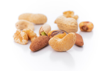 Fototapeta premium different types of nuts on a white background