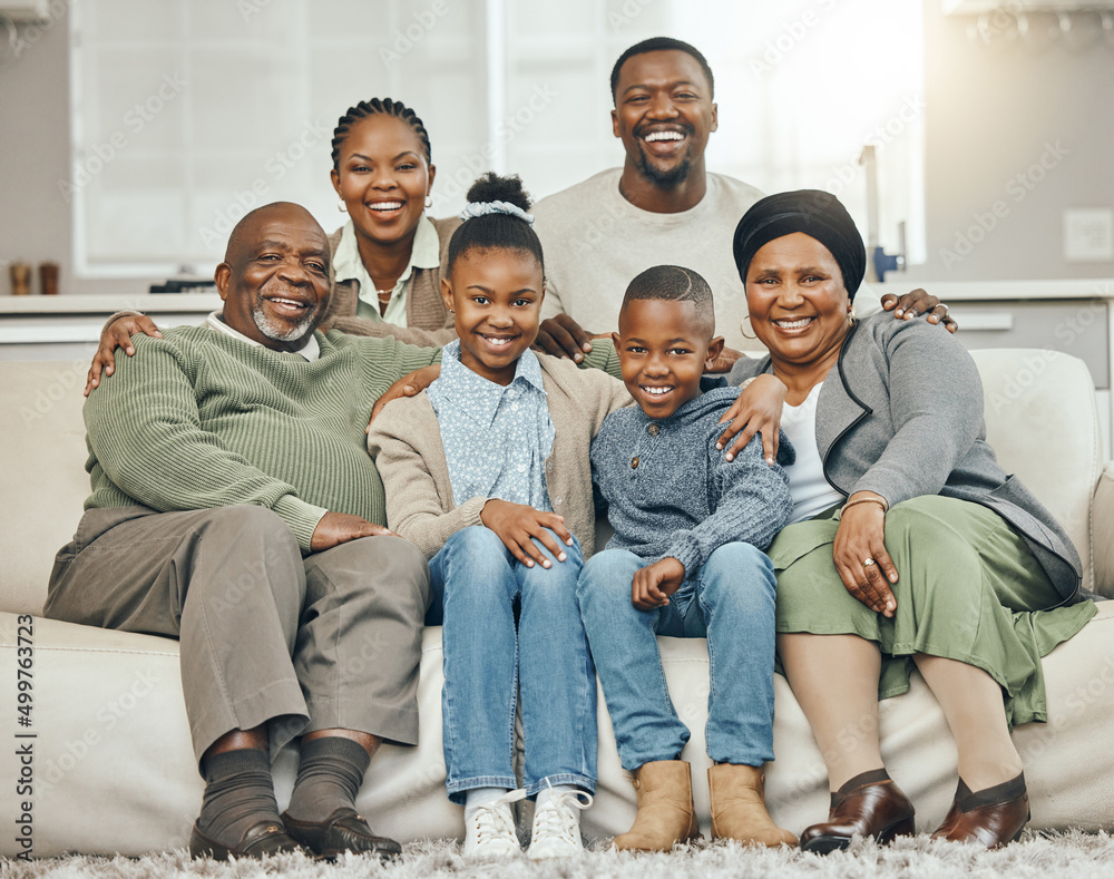 Poster Family is forever. Shot of a family bonding on a sofa at home.