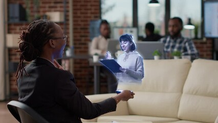 Augmented reality metaverse virtual video conference meeting between business women in start up office using modern hi tech futuristic advanced hologram holographic technology. Online internet future - Powered by Adobe