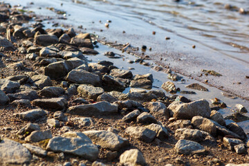 Rocks and pebbles by the water