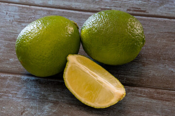 fresh lime isolated on gray background
