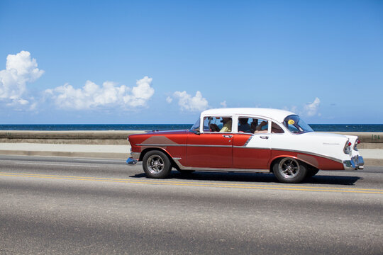 old car on the road in cuba