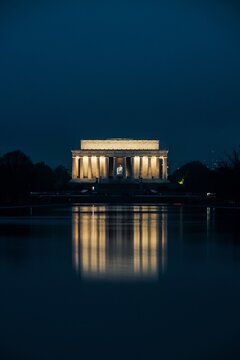Illuminated Lincoln Memorial and Lincoln Memorial Reflecting Pool at night, Washington DC, USA