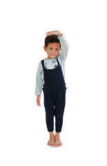 Asian little boy estimate his height by hand on white background. Image with Clipping path