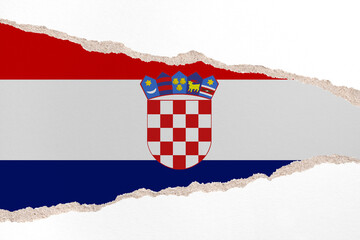 Ripped paper background in colors of national flag. Croatia