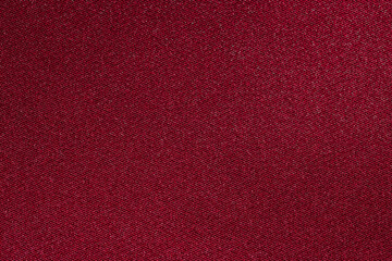 Fototapeta premium Close up of red plain textile material.