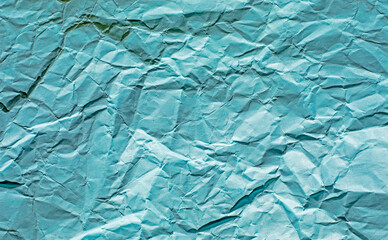 abstract background from crumpled blue paper, horizontal