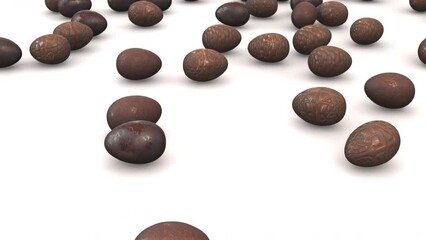 Chocolate easter eggs rolling down on slope