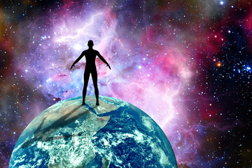 human male standing on Earth and universe in front of him