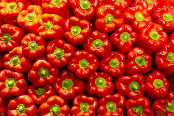 close-up of group of stacked red peppers