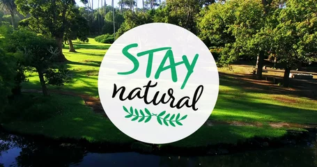 Foto auf Acrylglas Naturpark Bild des natürlichen Textes „Stay“ über dem Park