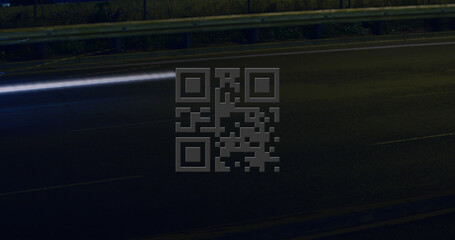 Image of glowing qr code over red light trails