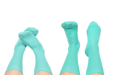 Woman in blue socks isolated on white background. Top view.