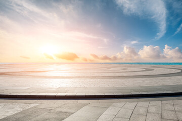 Empty square floor and lake with sky clouds nature landscape at sunset