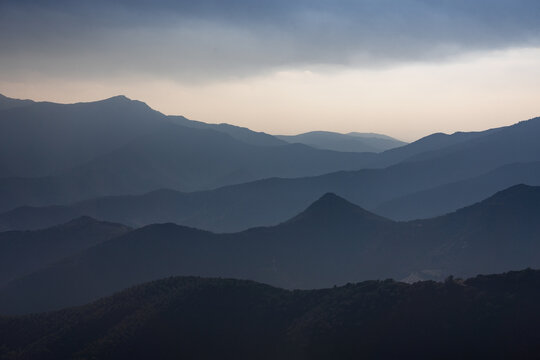 Hazy silhouette of mountains in the Massif des Alberes range of the Pyrenees mountains