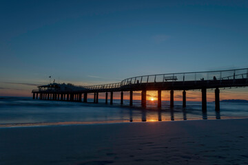 Fototapeta na wymiar Pier at Sunset