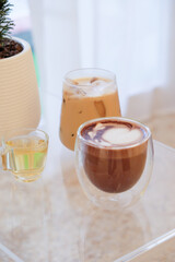 Hot chocolate and Ice coffee in cafe.