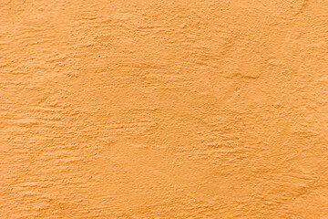 Orange cement texture background. Old mortar abstract background. Mortar wall texture. Concrete bare wallpaper