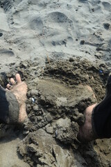feet on the beach