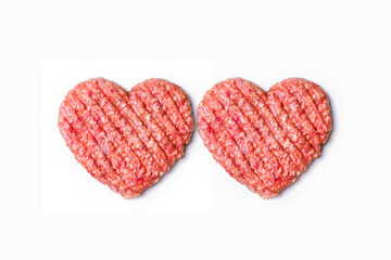 Dinner for lovers on February 14th. Mince heart. Meat cutlet in the shape of a heart. Meat love. Valentine's Day