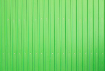 Corrugated iron or metal galvanized plate or board panel for industrial warehouse. Green Abstract background.