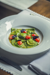 Ravioli, Tomatoes, Basil on White Plate, Restaurant food