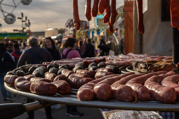 Close-up of raw sausages prepared for grilling