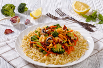 quinoa with fried veggies, mushrooms on plate