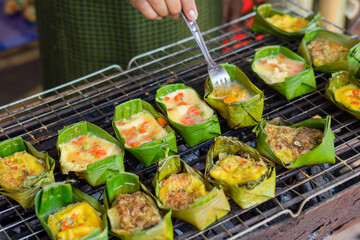 Khai-Pam, It's food a native of Northern Thai food style,
Grilling eggs with banana leaves,Kind of local street food 
in the north of Thailand