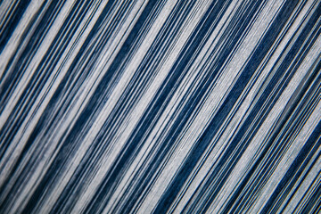 Fototapeta premium Seamless pattern fabric texture on weaving textile machine.