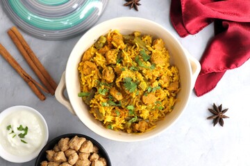 Soya chunks Biryani. Basmati rice cooked with Soyabean or Soya vadi along with spices and vegetables. It's a complete protein rich and nutritious one pot meal. Copy space