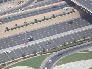 Dubai, UAE- March 31 2022: An empty street of expressway is constructed to facilitate faster...