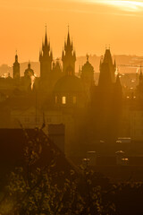 A Prague cityscape in the strong sunrise light.